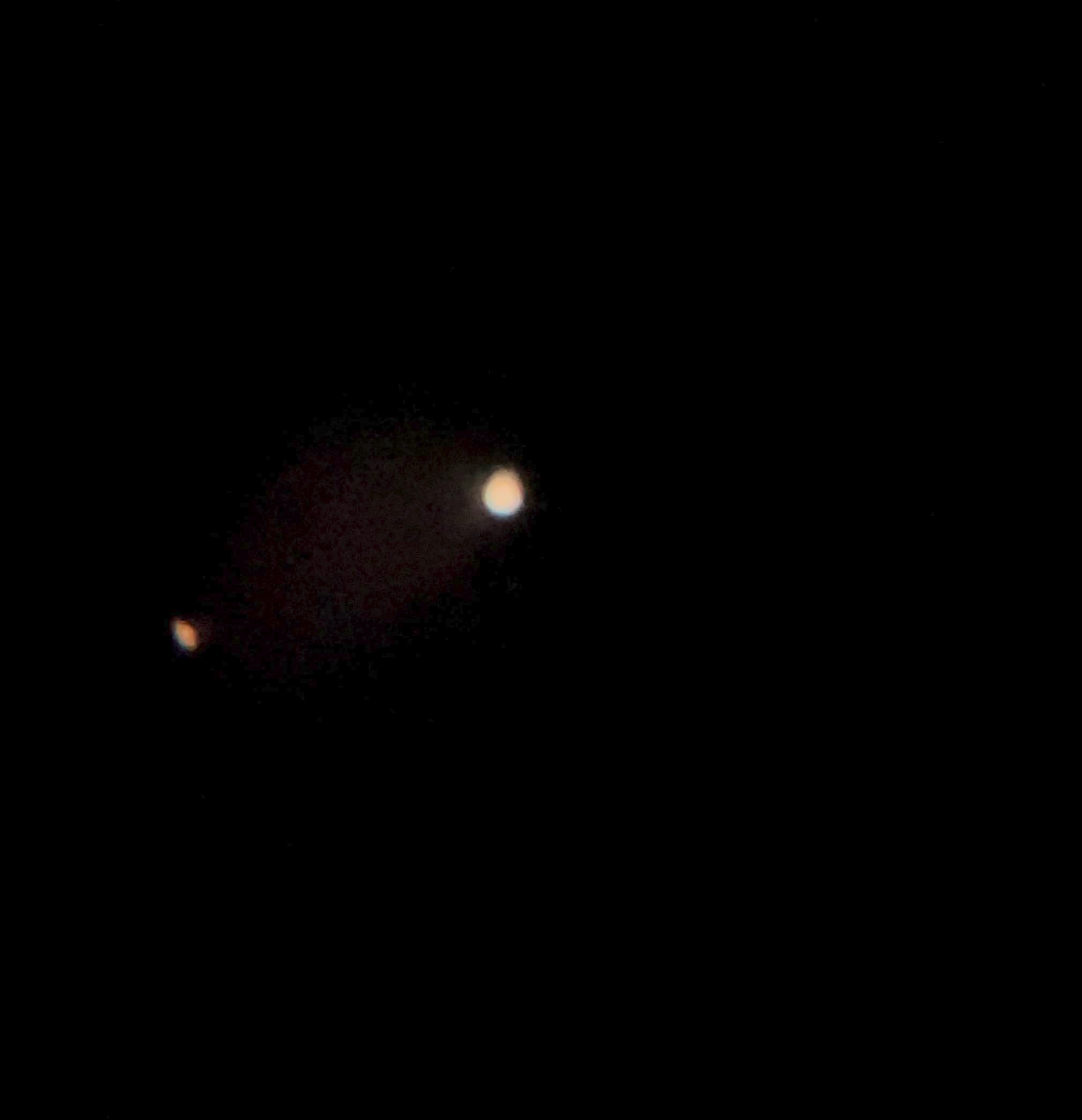 Jupiter (to your right) and Saturn as seen in telescope